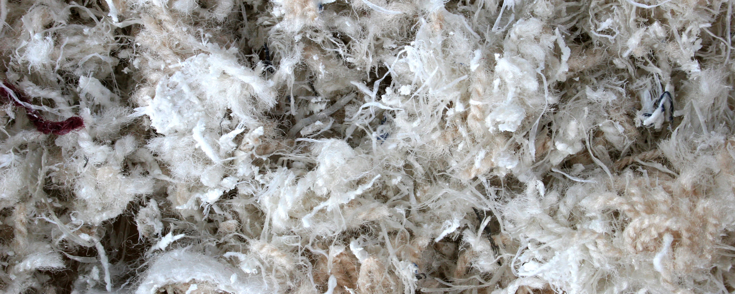 Closeup of shredded carpet scraps for recycling