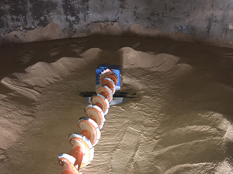 Laidig Cantilever Model 533 Soybean Meal, bulk material handling system, bridging, rat-holing, material flow, reclaim, reclaimer, silo unloading, unloader, bulk material storage, reclaim system, dry bulk unloading, feed and grain