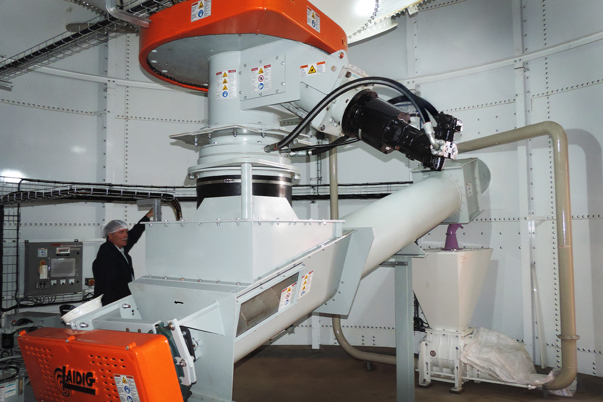 Laidig reclaimer inside flour milling facility bulk material handling system, bridging, rat-holing, material flow, reclaim, reclaimer, silo unloading, unloader, bulk material storage, reclaim system, dry bulk unloading, grain unloading, grain handling, flour milling, wheat bran, pellets