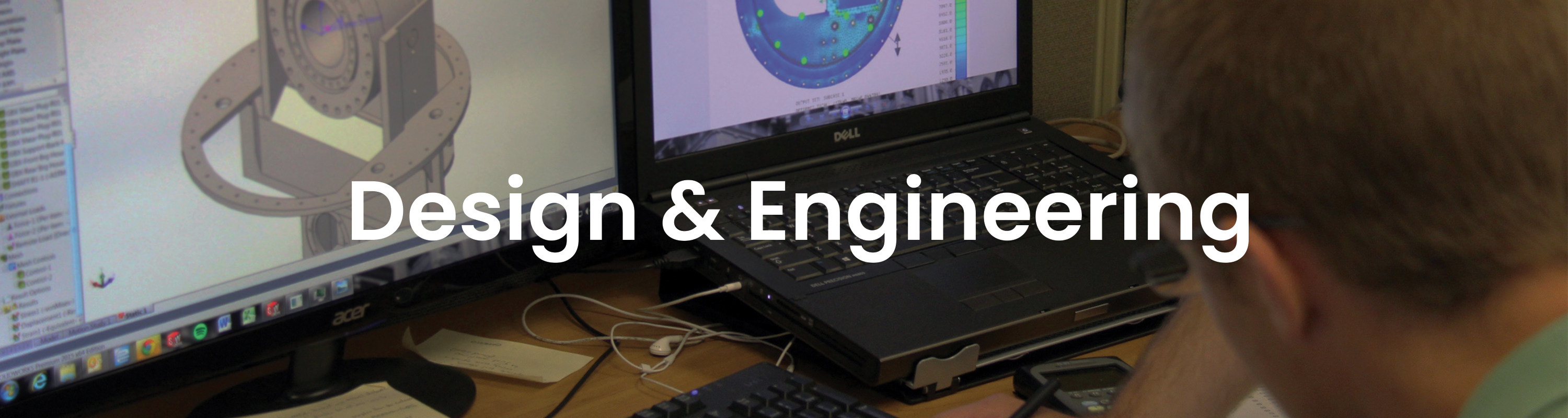 computer aided design software background with white text that reads DESIGN & ENGINEERING bulk material handling system, bridging, rat-holing, material flow, reclaim, reclaimer, silo unloading, unloader, bulk material storage, reclaim system, dry bulk unloading, grain unloading