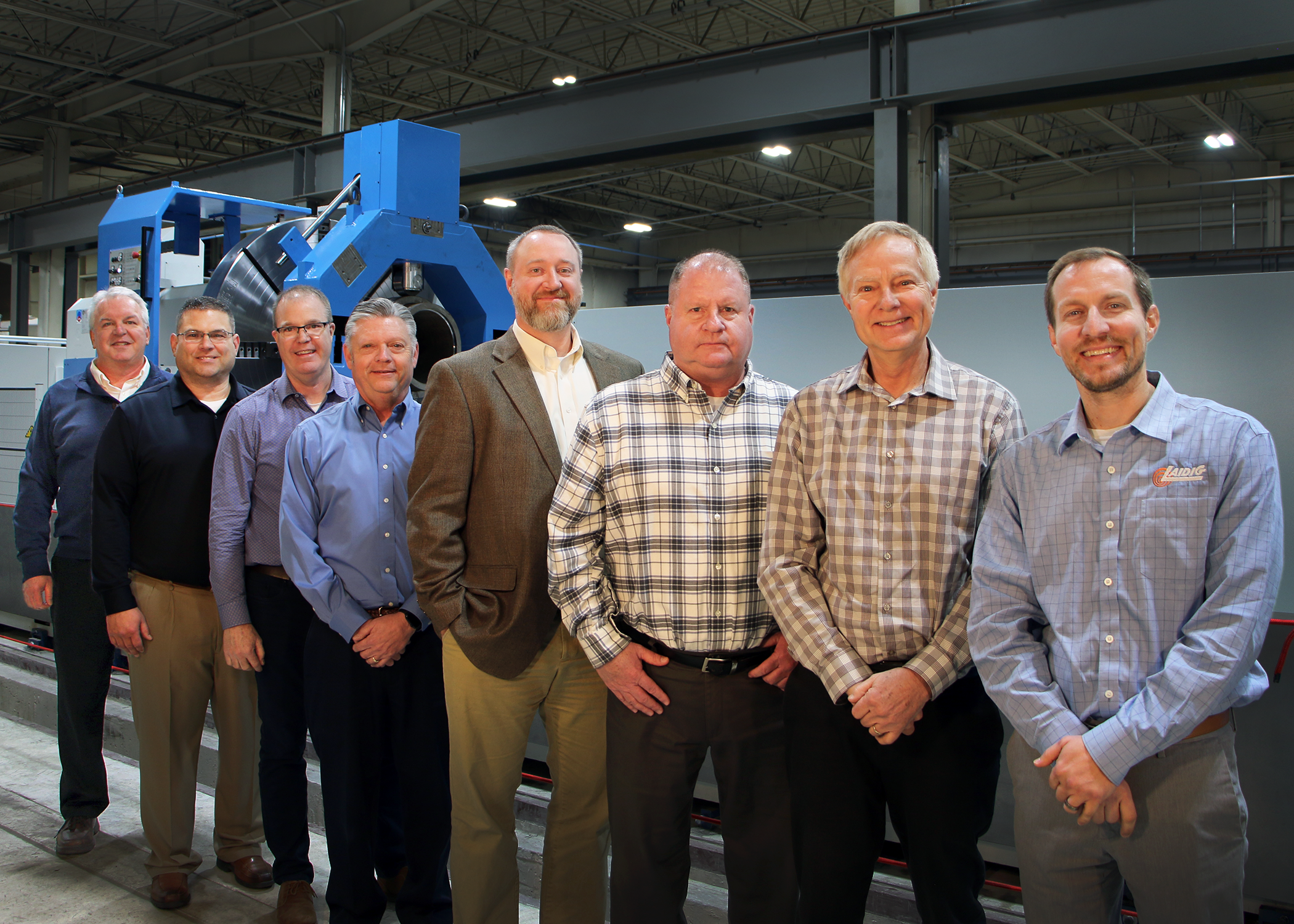 Laidig's team of leaders (left to right: Mark North, Tom Lindenman, Dan Collins, Mike Schuster, Cory Hamel, Ken Kujawski, Wyn Laidig, Daniel Laidig)