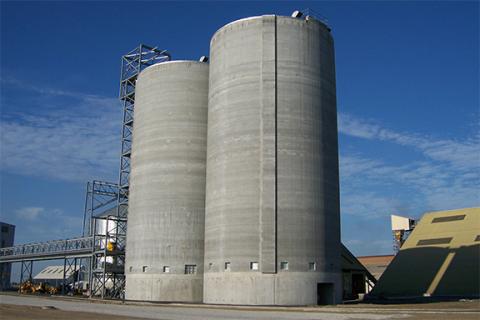 Concrete Silo bulk material handling system, bridging, rat-holing, material flow, reclaim, reclaimer, silo unloading, unloader, bulk material storage, reclaim system, dry bulk unloading, grain unloading